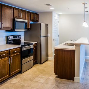 Model unit kitchen featuring modern finishes, and appliances