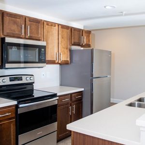Model unit kitchen featuring modern finishes, and appliances